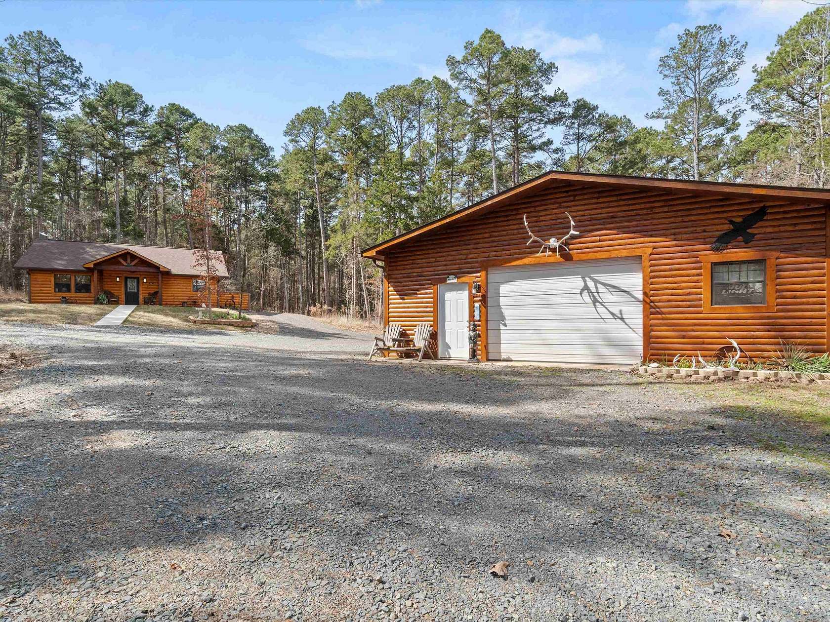 5.19 Acres of Land with Home for Sale in Avinger, Texas