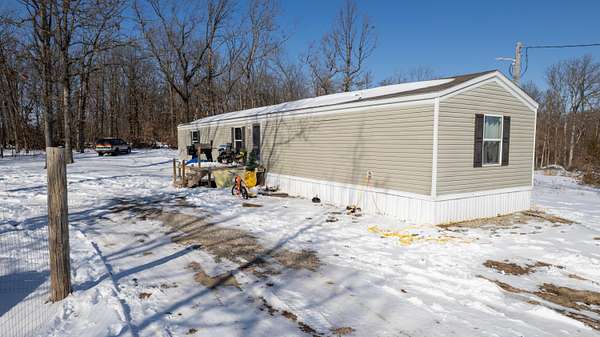 4.58 Acres of Land with Home for Sale in Conway, Missouri