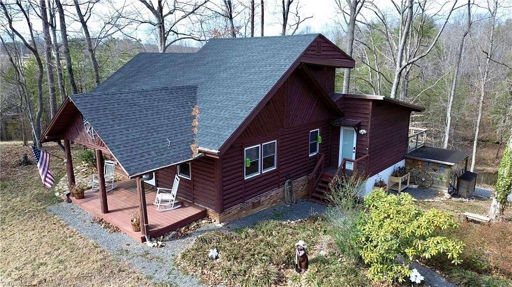 11.3 Acres of Land with Home for Sale in Dobson, North Carolina