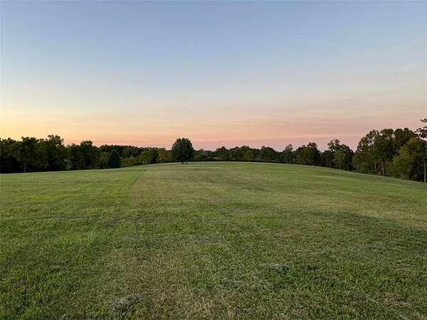 20 Acres of Commercial Land for Sale in Gravette, Arkansas