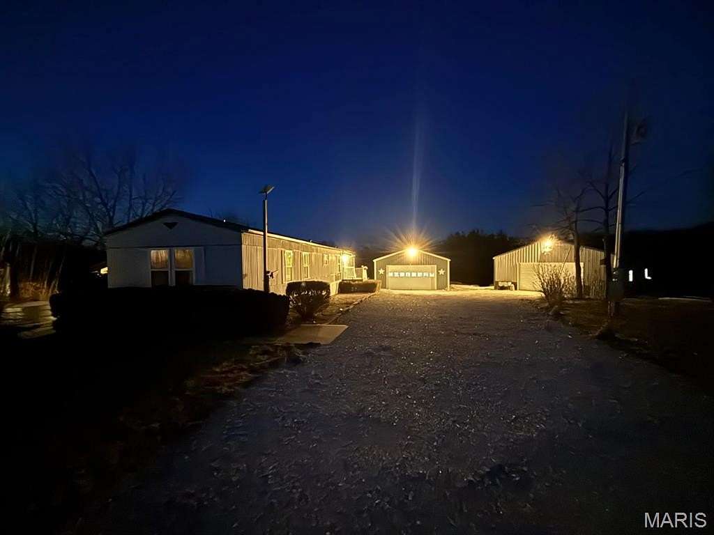 2.52 Acres of Land with Home for Sale in Paris, Missouri