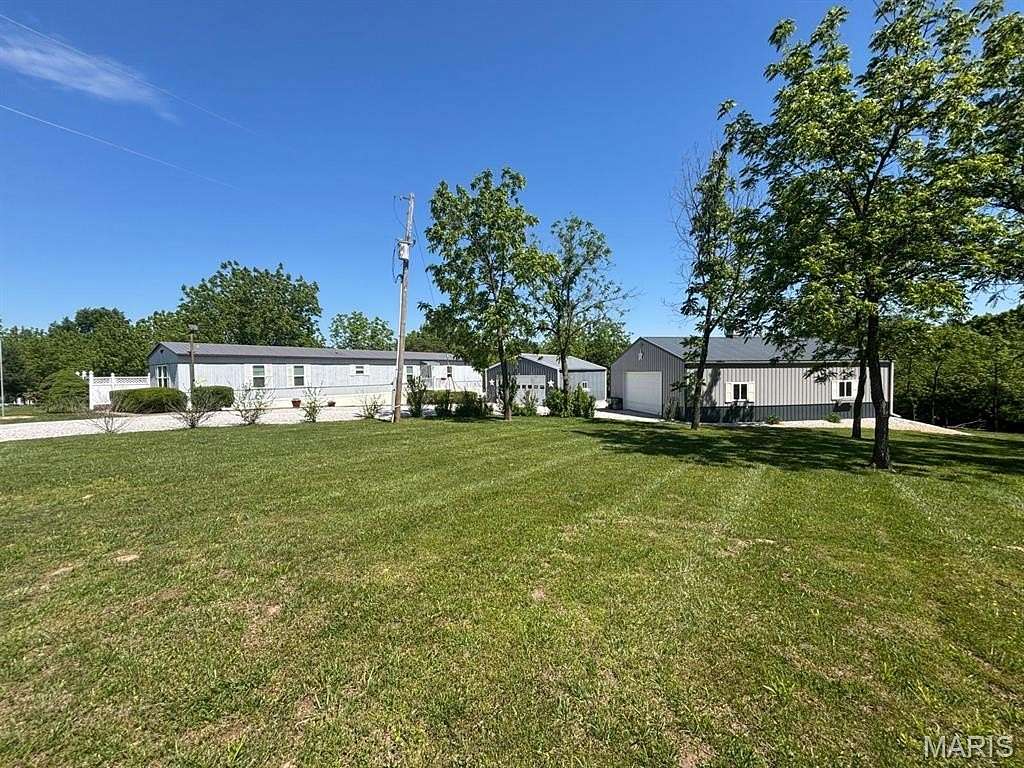 2.52 Acres of Land with Home for Sale in Paris, Missouri