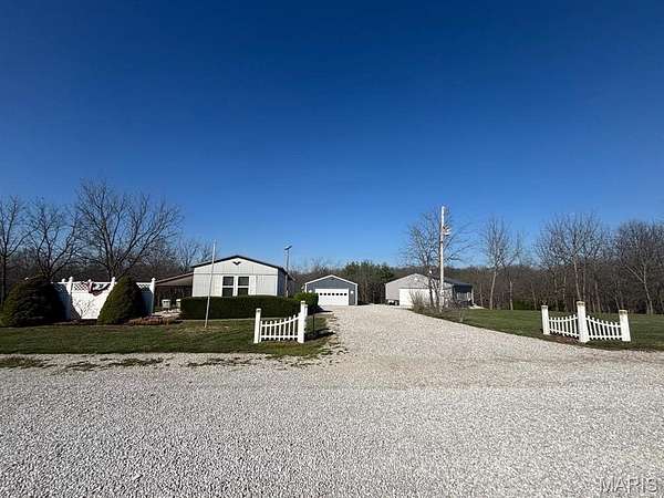 2.52 Acres of Land with Home for Sale in Paris, Missouri