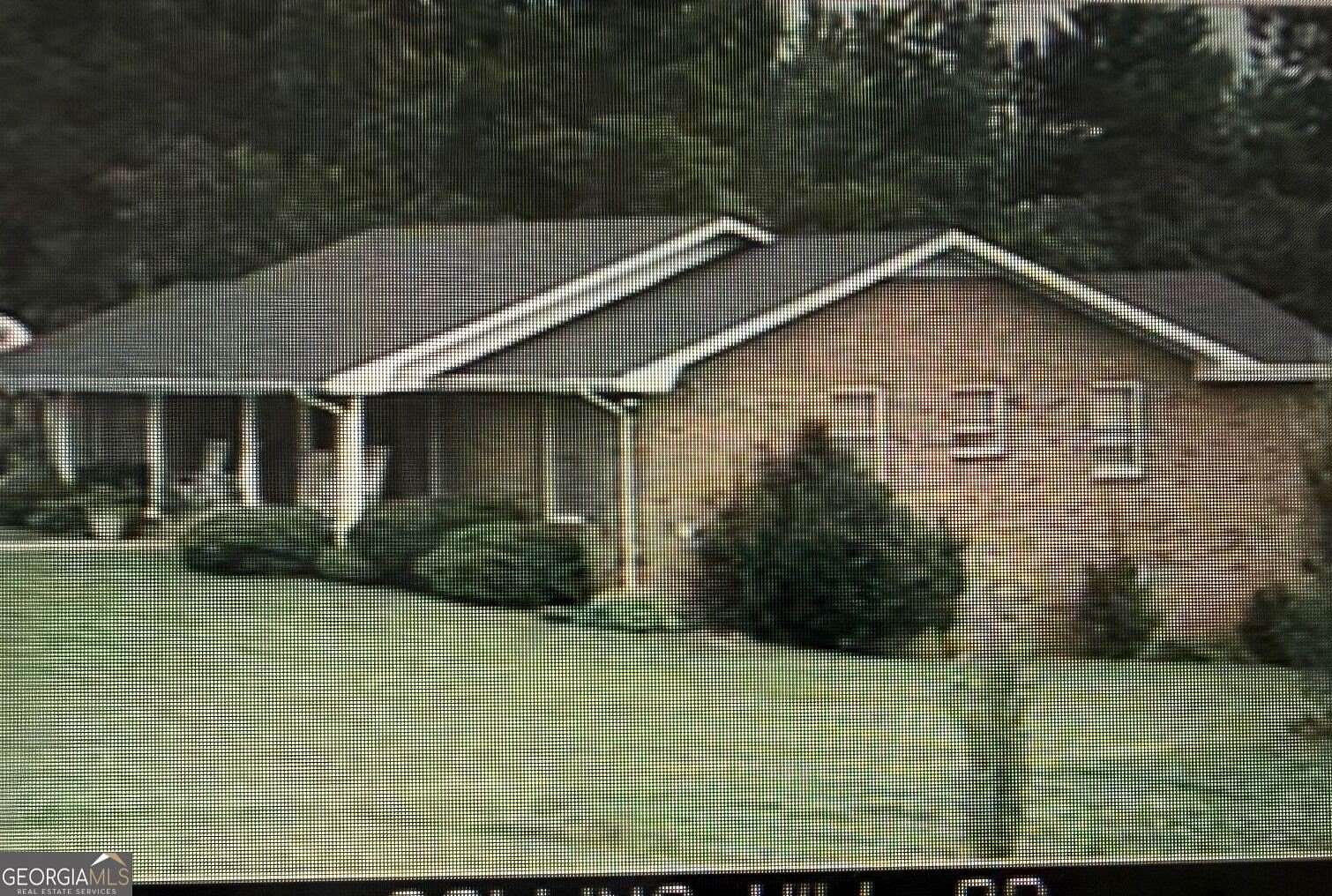 2.54 Acres of Land with Home for Sale in Lawrenceville, Georgia