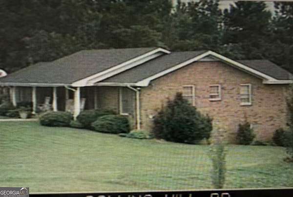 2.54 Acres of Land with Home for Sale in Lawrenceville, Georgia
