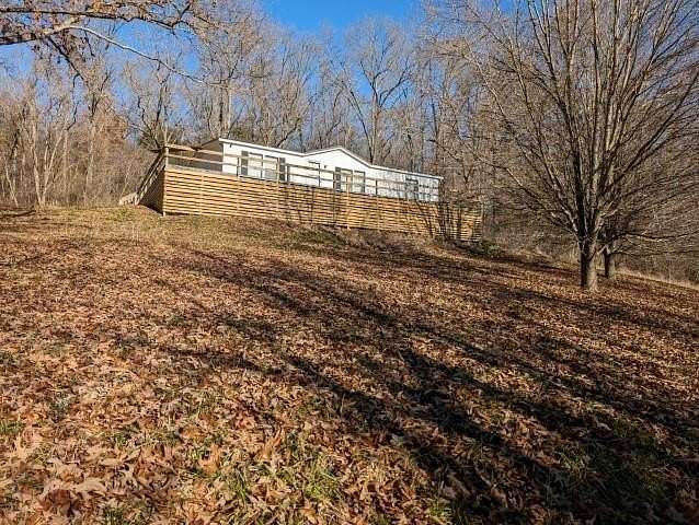 5 Acres of Land with Home for Sale in Alpena, Arkansas