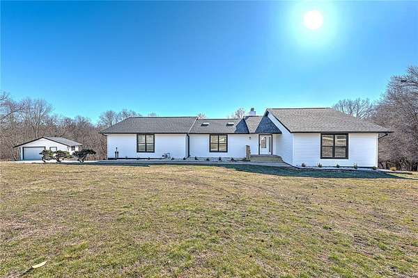 2.89 Acres of Land with Home for Sale in Rogers, Arkansas