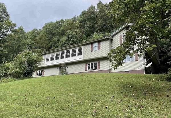 27.7 Acres of Land with Home for Sale in Crum, West Virginia