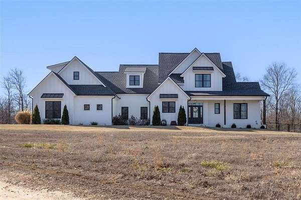 8.24 Acres of Land with Home for Sale in Decatur, Arkansas