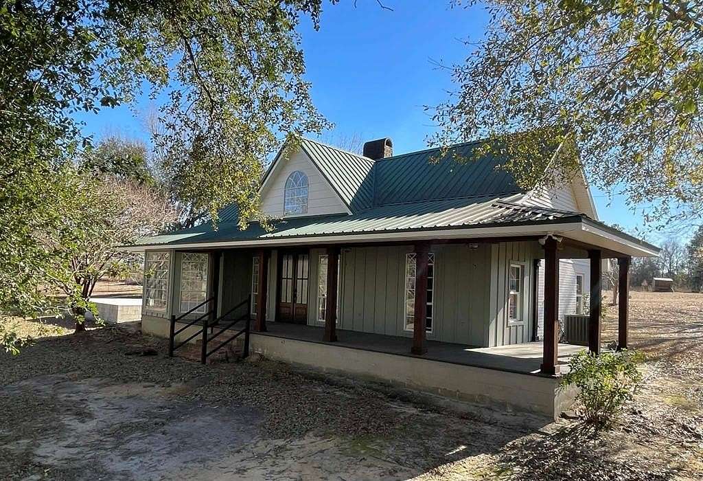 20.1 Acres of Agricultural Land with Home for Sale in Carriere, Mississippi