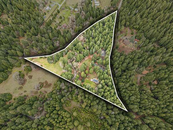 6.65 Acres of Land with Home for Sale in Selma, Oregon