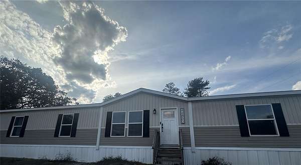 5 Acres of Land with Home for Sale in DeLand, Florida