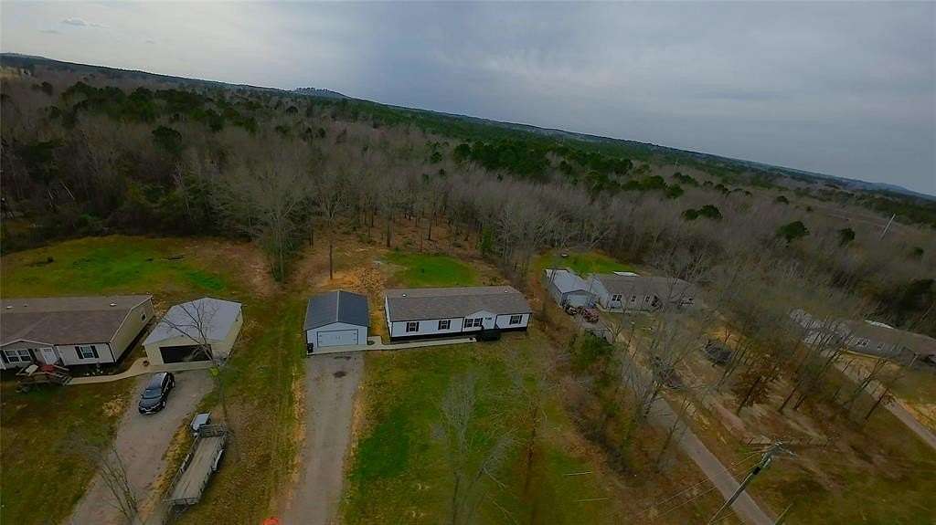 1.5 Acres of Land with Home for Sale in Gilmer, Texas