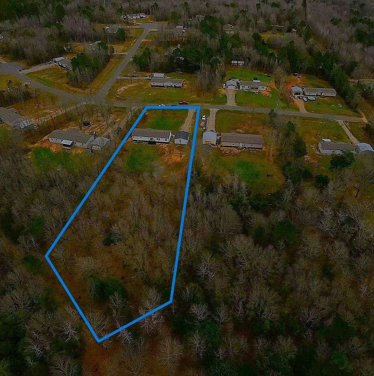 1.5 Acres of Land with Home for Sale in Gilmer, Texas
