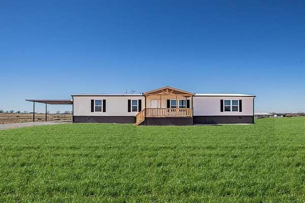 2.53 Acres of Land with Home for Sale in Poolville, Texas