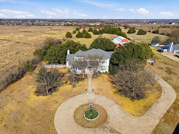 10 Acres of Land with Home for Sale in McLendon-Chisholm, Texas