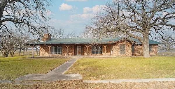 2 Acres of Land with Home for Lease in Springtown, Texas