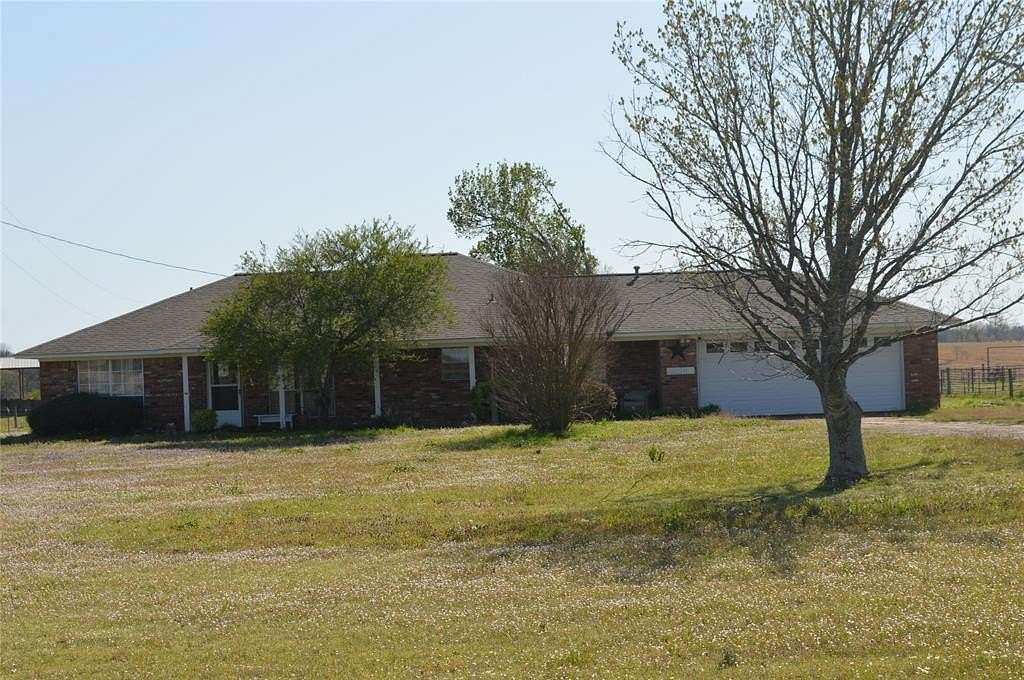 5 Acres of Land with Home for Sale in Avery, Texas