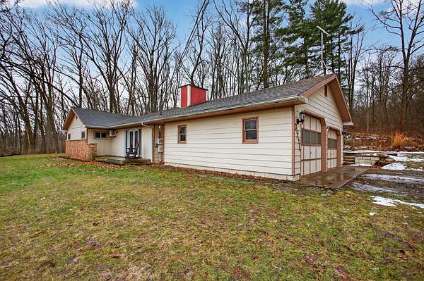 2 Acres of Land with Home for Sale in Parma, Michigan