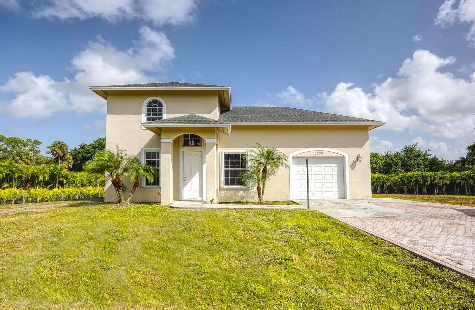 5 Acres of Land with Home for Sale in Loxahatchee Groves, Florida