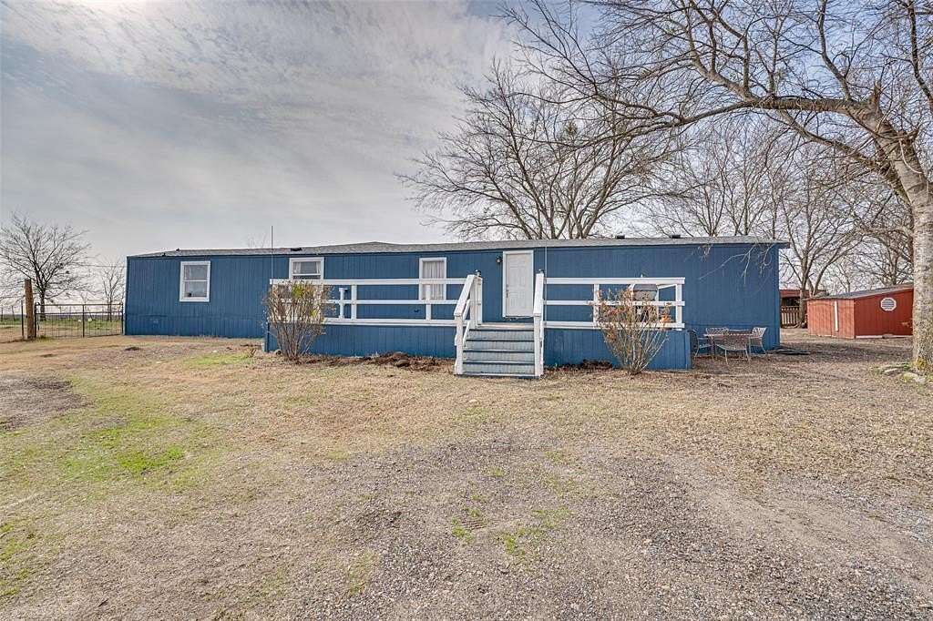 2.55 Acres of Land with Home for Sale in Ennis, Texas