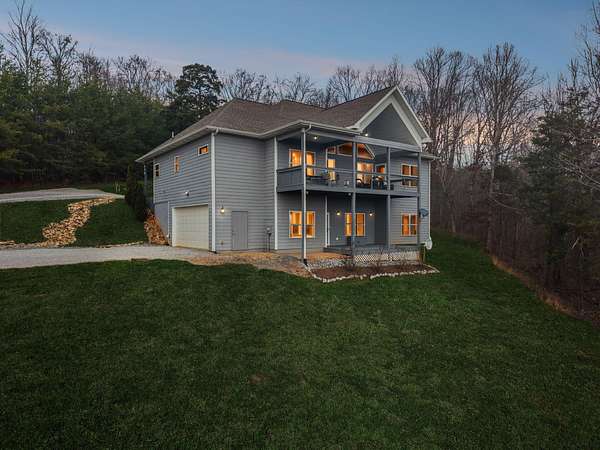 5.46 Acres of Land with Home for Sale in Riceville, Tennessee