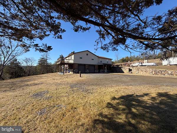 88.3 Acres of Agricultural Land with Home for Sale in Keyser, West Virginia