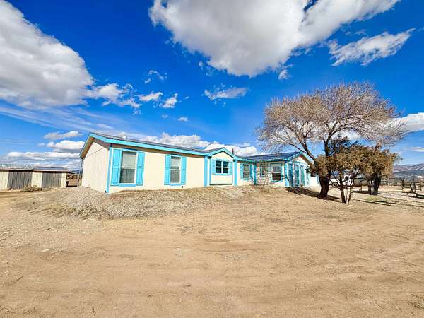 2 Acres of Land with Home for Sale in El Prado, New Mexico