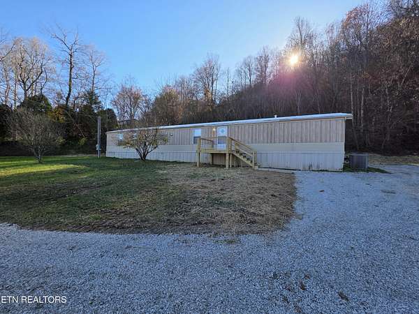 2.56 Acres of Land with Home for Sale in Jellico, Tennessee