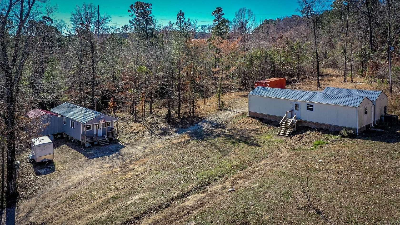 6.47 Acres of Land with Home for Sale in Bismarck, Arkansas