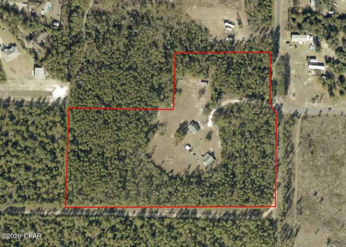 10.3 Acres of Recreational Land with Home for Sale in Southport, Florida