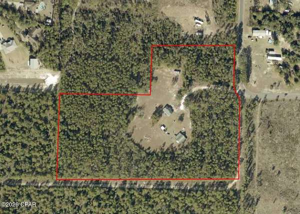 10.3 Acres of Recreational Land with Home for Sale in Southport, Florida