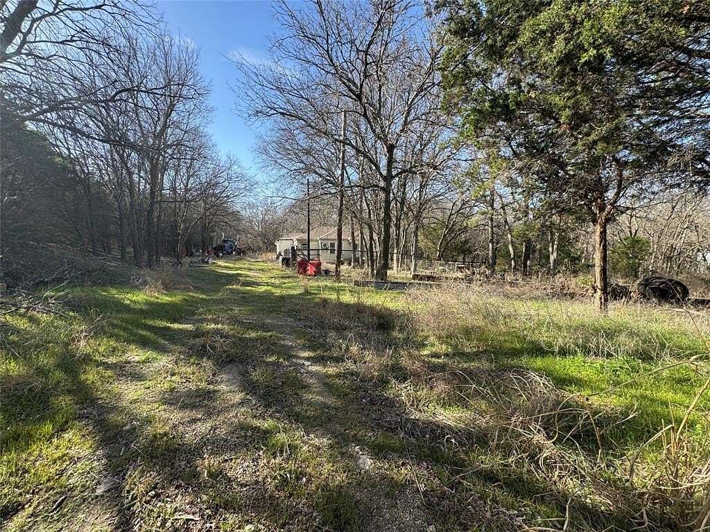2.19 Acres of Land with Home for Sale in Cresson, Texas