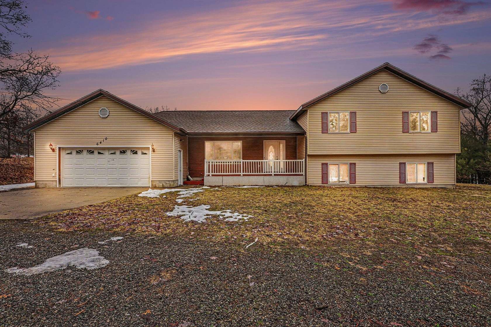 3 Acres of Land with Home for Sale in Twin Lake, Michigan