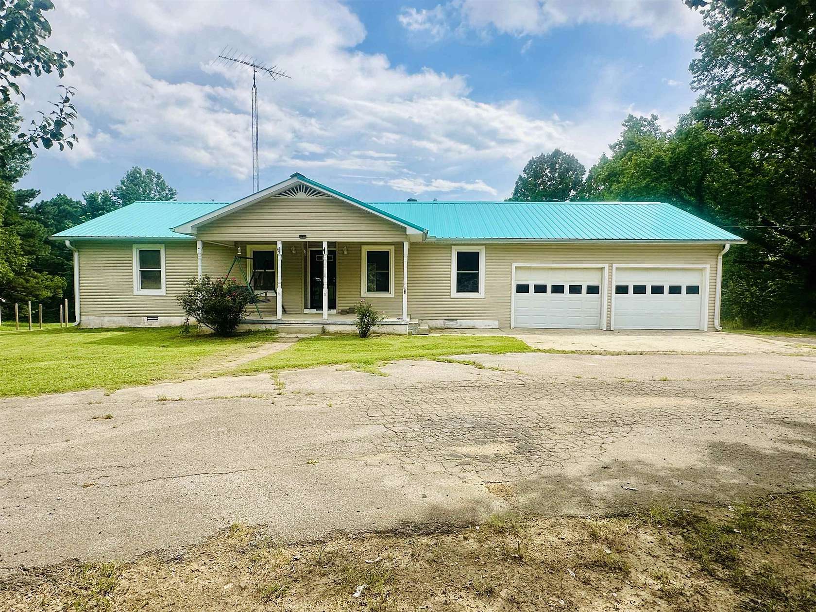 1.55 Acres of Land with Home for Sale in Adamsville, Tennessee