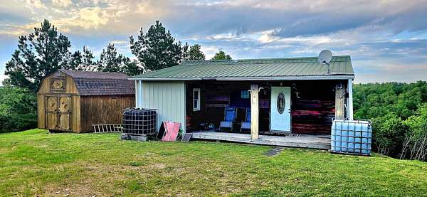 190 Acres of Land with Home for Sale in Buffalo, Tennessee