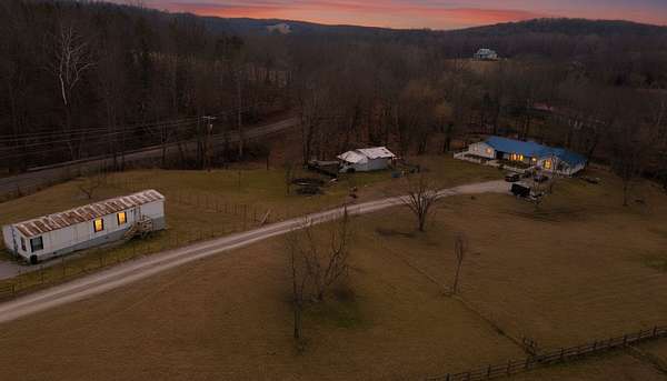 5.8 Acres of Land with Home for Sale in Hohenwald, Tennessee