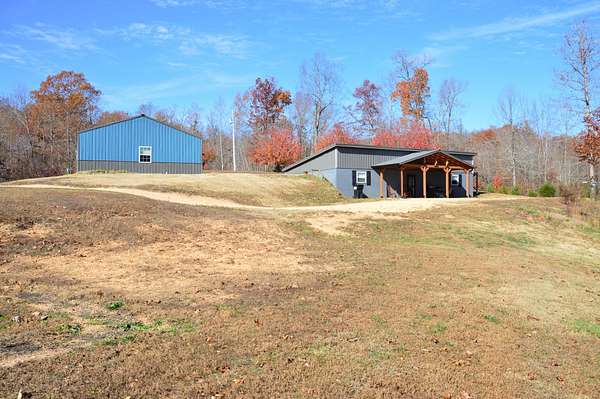 15.4 Acres of Land with Home for Sale in Linden, Tennessee