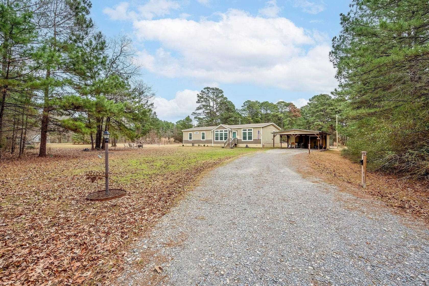 3.89 Acres of Land with Home for Sale in Waskom, Texas