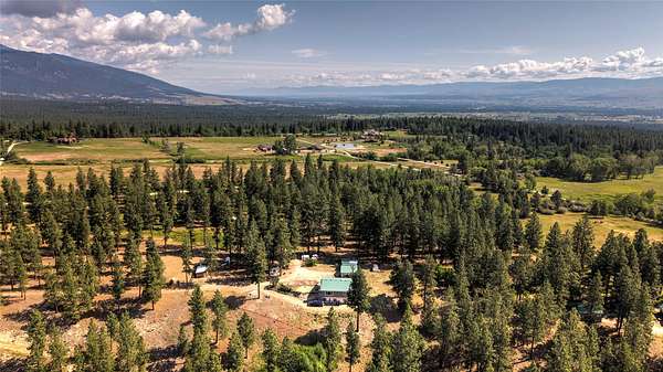 21 Acres of Land with Home for Sale in Victor, Montana