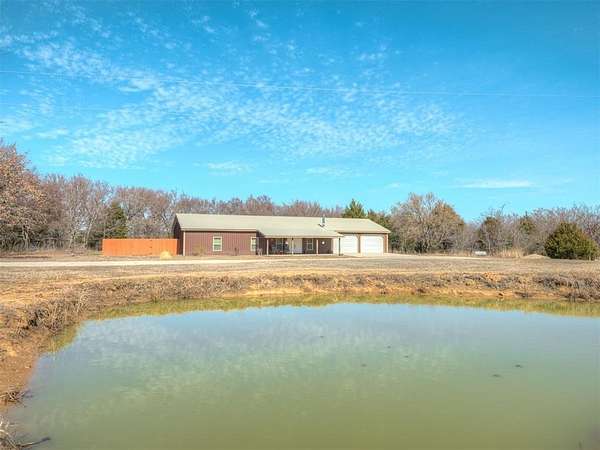 18 Acres of Land with Home for Sale in Okemah, Oklahoma