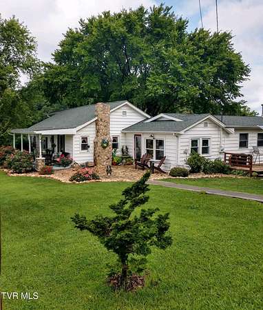 7.7 Acres of Land with Home for Sale in Mount Carmel, Tennessee
