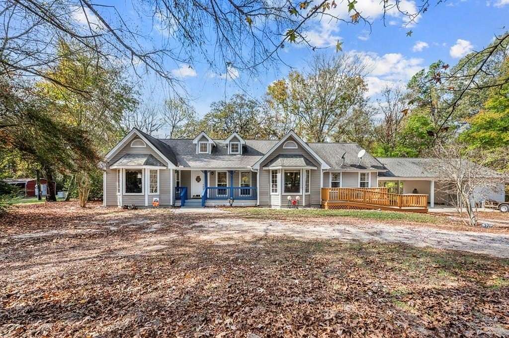 72.8 Acres of Recreational Land with Home for Sale in Center, Texas