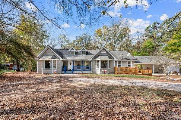 72.8 Acres of Recreational Land with Home for Sale in Center, Texas