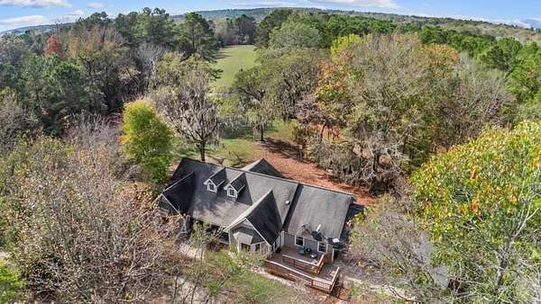 72.8 Acres of Recreational Land with Home for Sale in Center, Texas