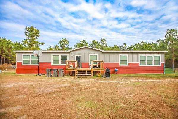 10 Acres of Land with Home for Sale in Groveton, Texas