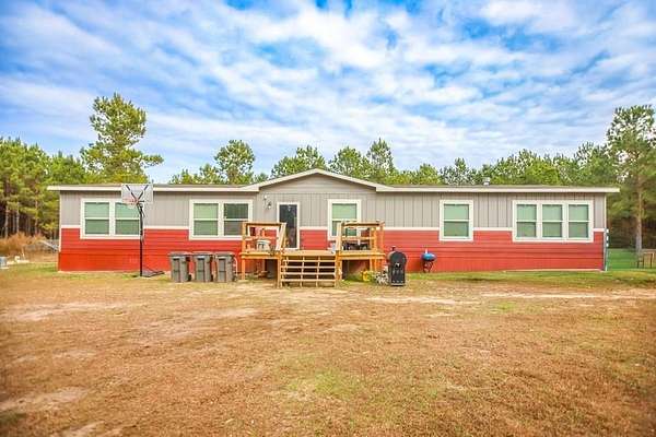 10 Acres of Land with Home for Sale in Groveton, Texas
