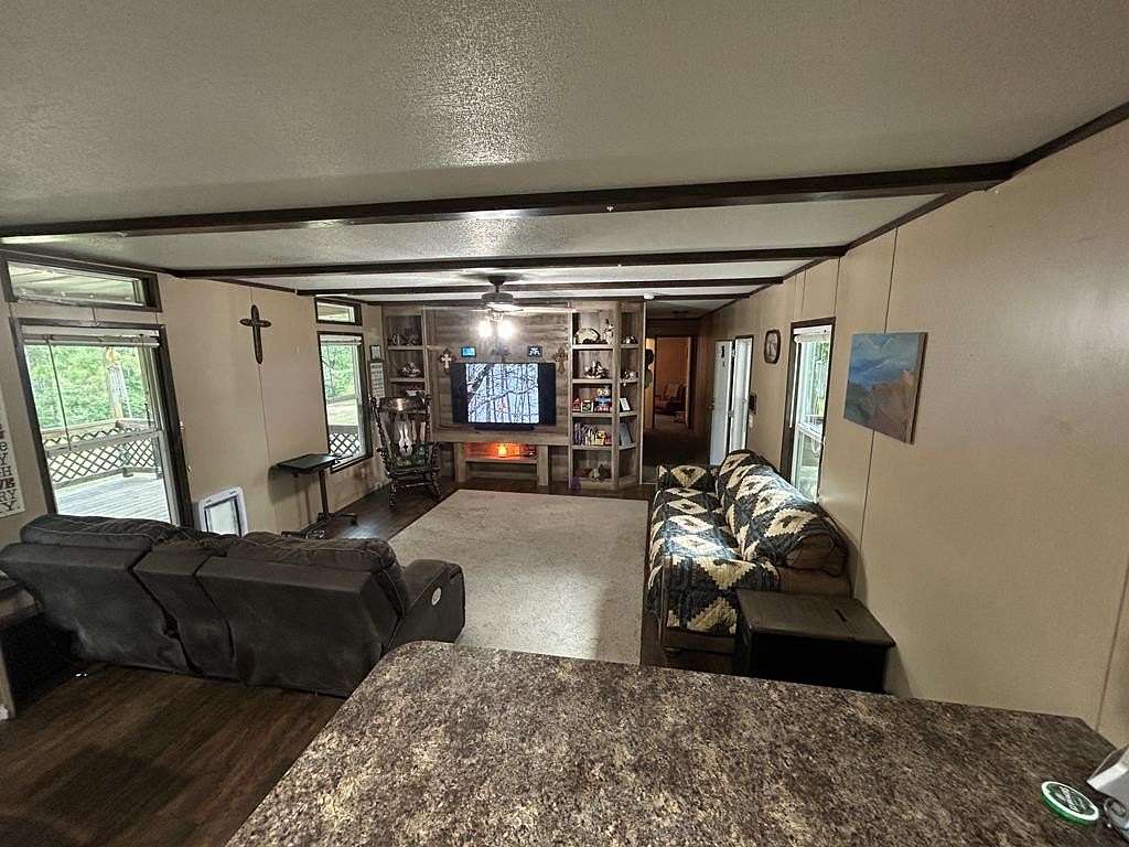 8.3 Acres of Land with Home for Sale in Colmesneil, Texas