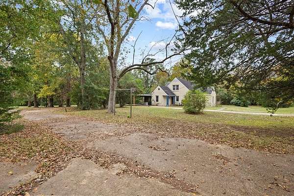 1.83 Acres of Land with Home for Sale in Woodville, Texas