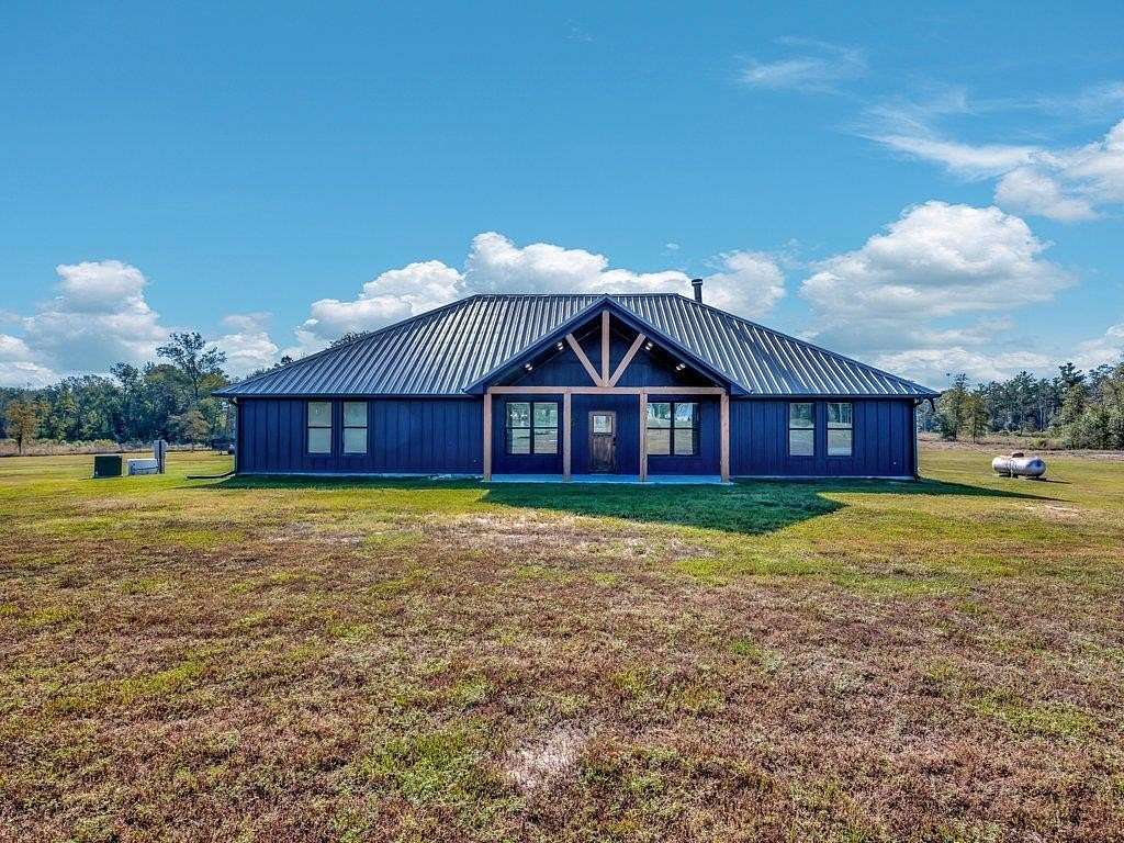 10 Acres of Land with Home for Sale in Apple Springs, Texas